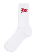 White Patta sports socks with haute red patta script logo